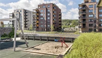 Bilde av fellesområde og lekeplass på Strømmen Verksted