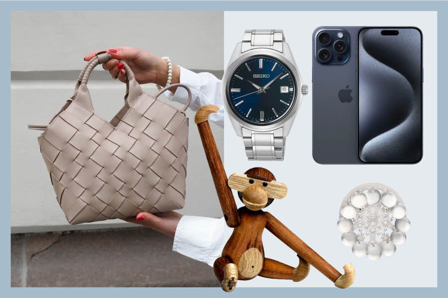 Hender holder en skinnveske, klokke, iPhone, Kai Bojesen ape, bunadsølje