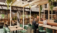 3D-illustrasjon av kantinen i Vika Atrium, med møbler i lyst treverk, grønne klatreplanter og naturlig lys som kommer inn fra taket