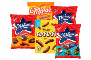 To poser fra Minde og tre poser fra Nidar med sjokolade.
