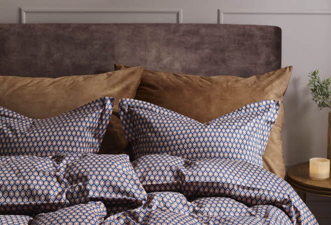 En seng redd opp med sengesettet Pierre fra Princess