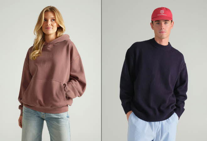 Dame i brun hettegenser og jeans, og en mann i mørk genser, lyse bukser og rød caps.