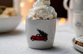 Kopp med krem på toppen