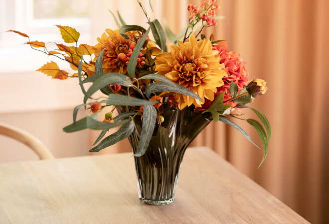 bilde av en blomster i en vase