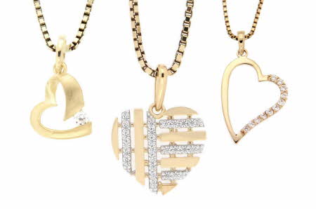 halskjeder i gull og diamanter formet som et hjerte