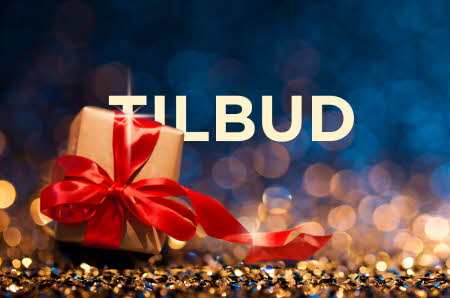 Pakke som ligger på glitter og teksten "Tilbud"