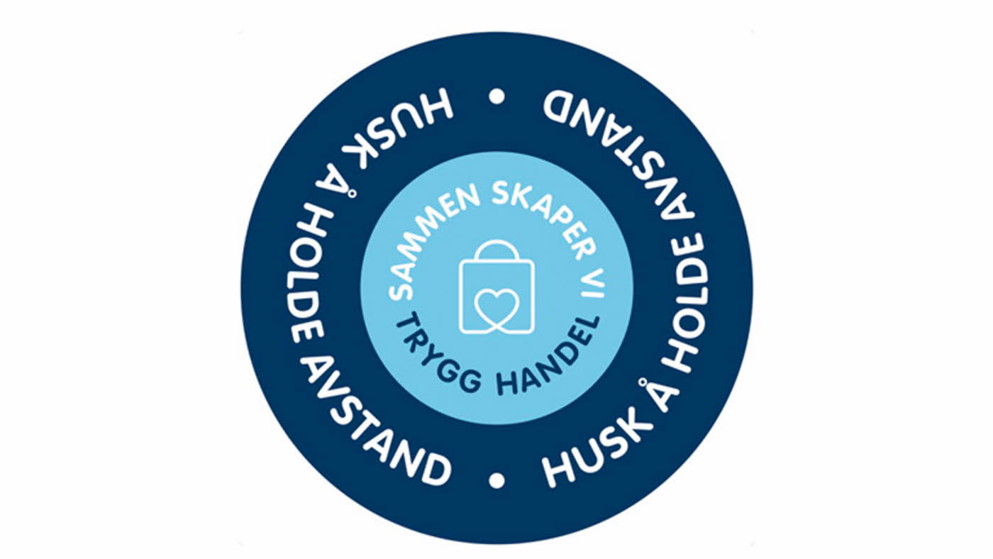 Sirkel med teksten "husk å holde avstand"