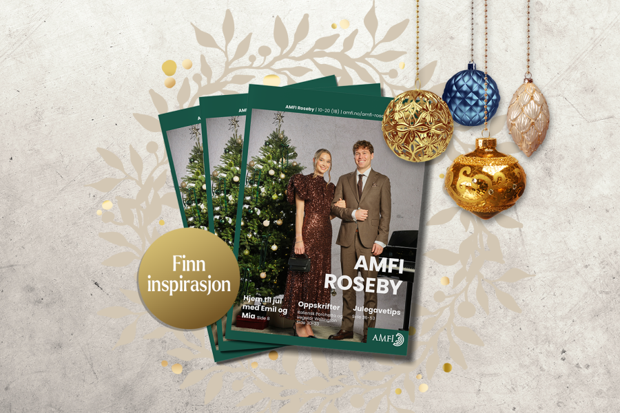 Forside av et magasin med dame og mann ikledd juleantrekk og smiler til kamera