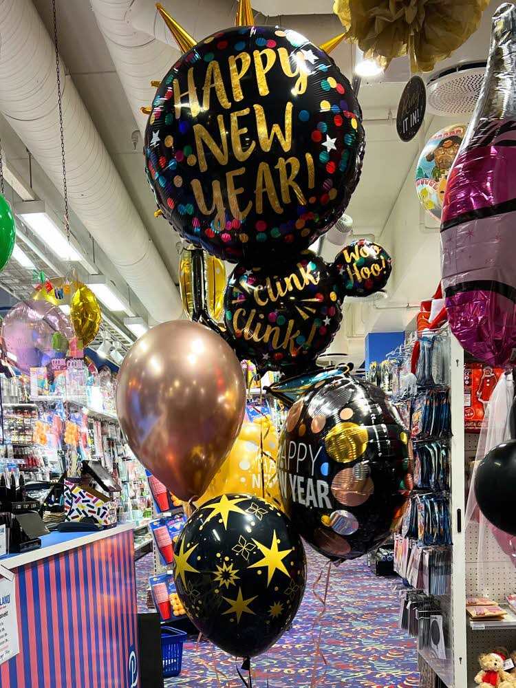 Ballonger med teksten "Happy New Year"