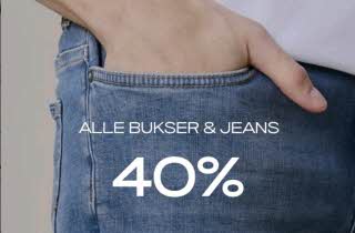 Nærbilde av en hånd som stikkes i lommen på en jeans, med teksten: Alle bukser & jeans 40 %