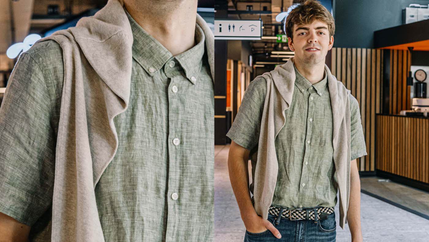 Mann i beige tskjorte og beige genser