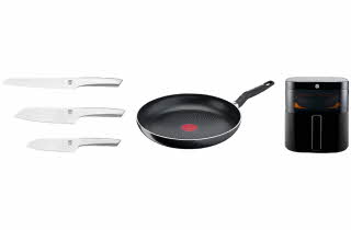 Tre kjøkkenkniver, en stekepanne og en airfryer