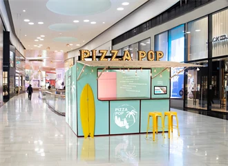 Bildet viser en pop up store / standleie på et kjøpesenter.