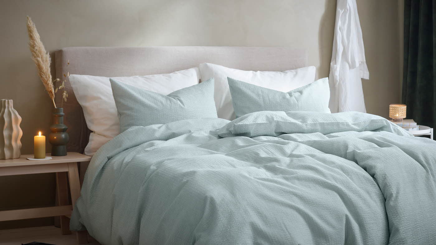 lyseblått sengetøy