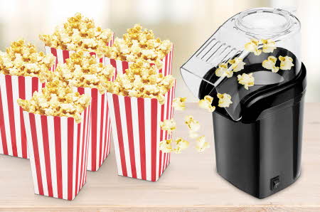sort popkornmaskin og seks popkornbeger