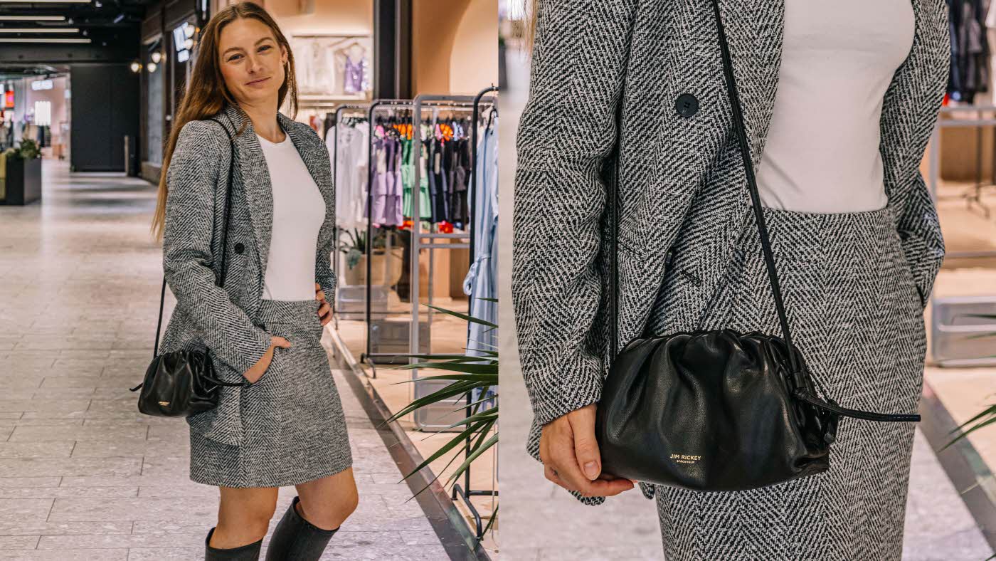 Dame i grå dress