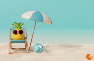 En ananas som soler på en sandstrand