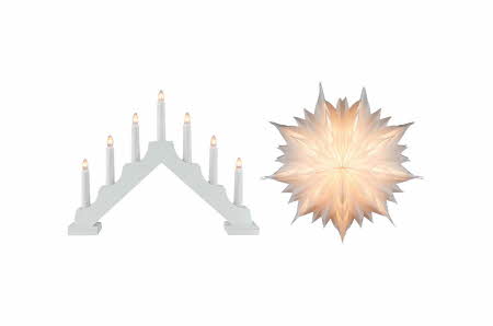 En hvit adventsstake og en hvit papirstjerne