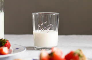Ett Norgesglasset med melk.