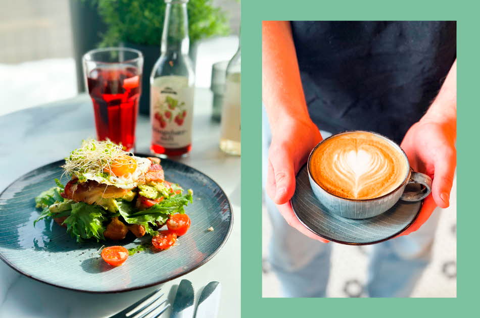 Tallerken med smørbrød med egg fra Jorbærpikene, på et bord med glass med saft. Hender holder en kaffe latte.