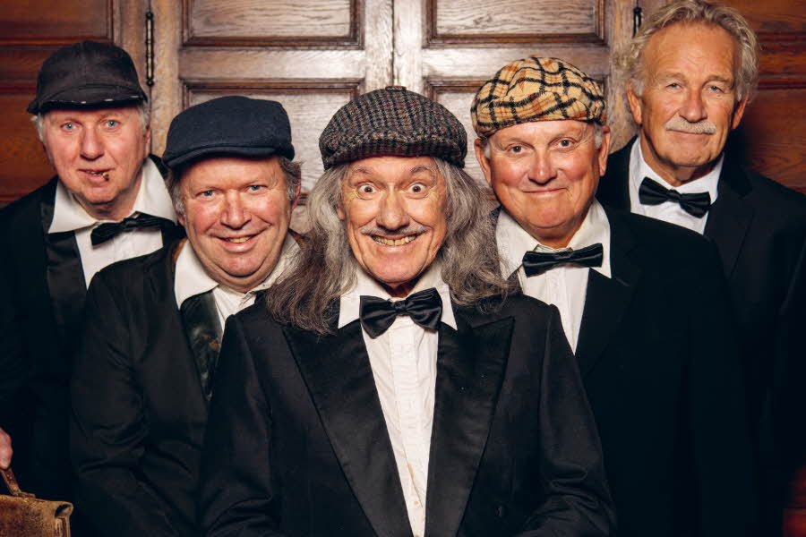 Bilde frå omslaget til boka «Vinskvetten 50 år – humor på ramme alvor».