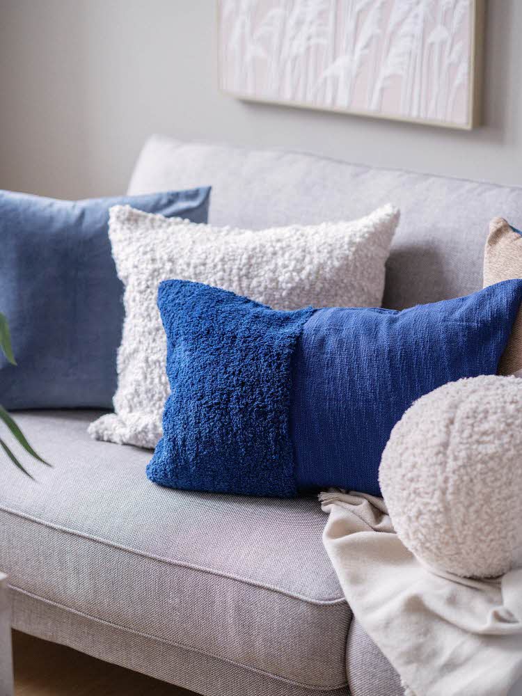Sofa med puter
