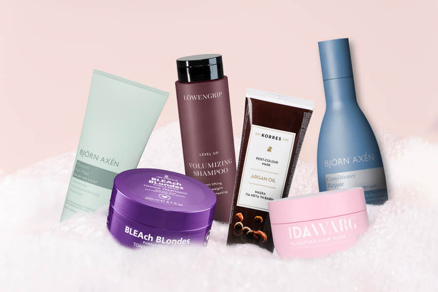 diverse flasker med shampoo, balsam og hårkur