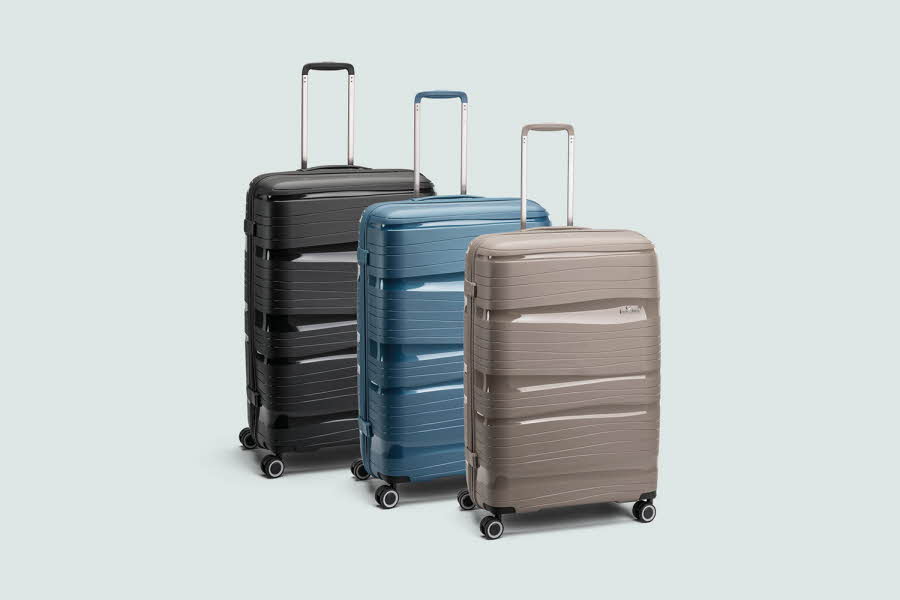 sort, blå og beige koffert