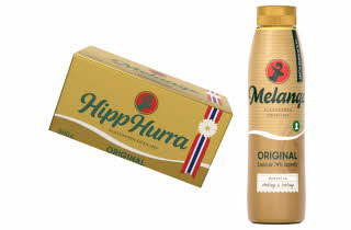 En pakke og en flaske med Melange margarin