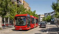 Bilde av en buss i en gate på Strømmen
