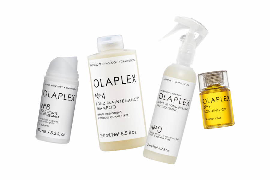 hårprodukter i hvite og gjennomsiktig beholdning fra olaplex
