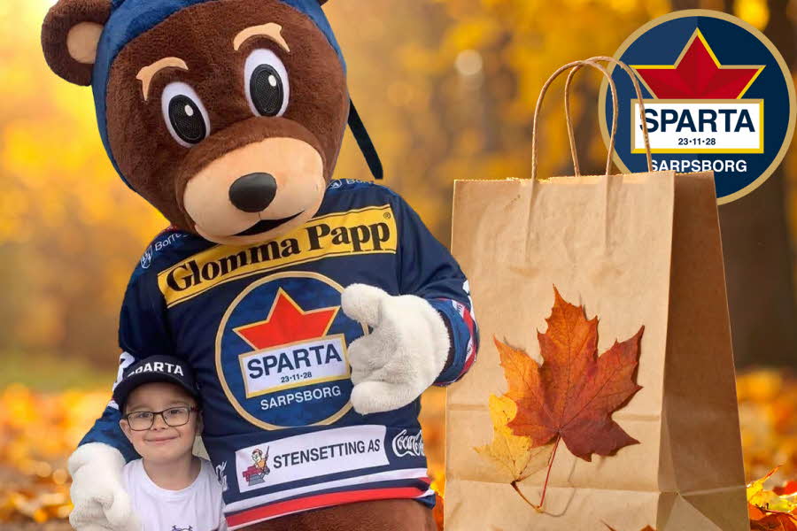 Bamse som holder rundt et barn og papirpose med høstblader og logoen til Sparta