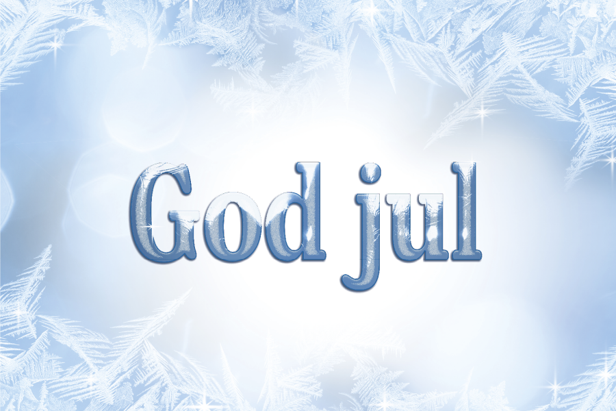 Hvit og blått grafisk bilde med snøkrystaller og teksten "God Jul"