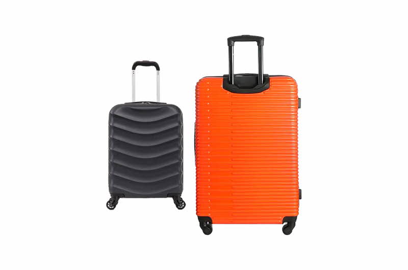 En oransj koffert og en mindre sort koffert