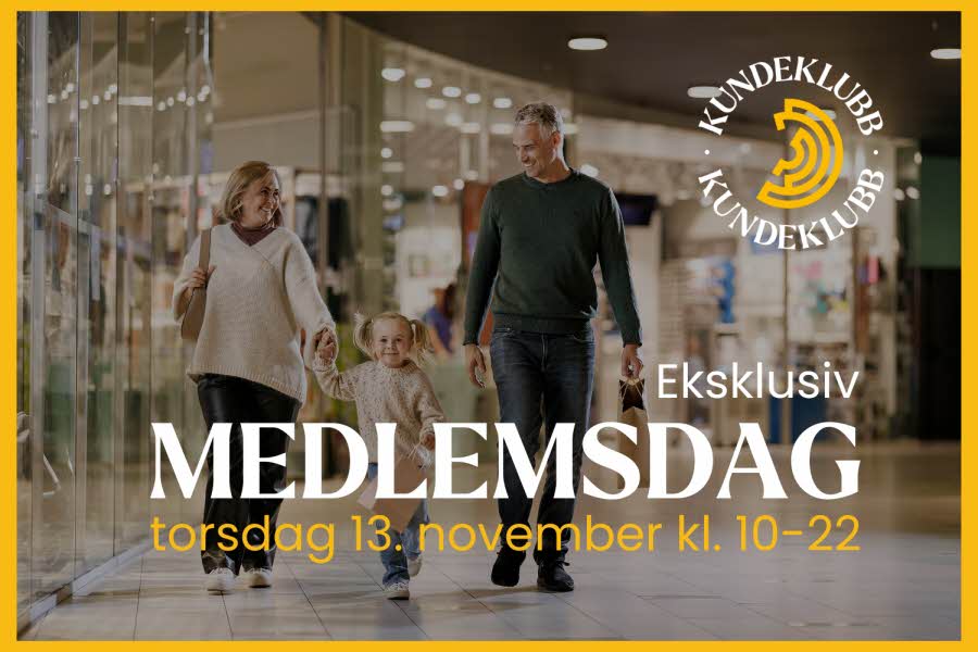 En mann, en dame og et barn på et kjøpesenter