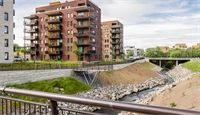Bilde av Strømmen Verksted med Sagelva i forgrunnen